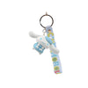 Cinnamoroll sleutelhanger in blauwe winterjas en muts