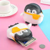 Compacte pinguïn portemonnee met kogelketting, een must-have schattig accessoire.